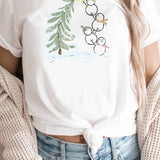 Snowmen Decorating Graphic Tee